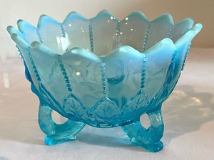 lot 23 image: Compilation of Lovely Antique Blue Glassware Pieces including Fenton Opalescent Blue Eye and Scroll Footed Bowl