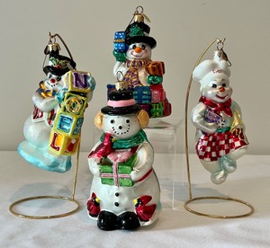 lot 196 image: Collection of Four Christopher Radko Snowman Ornaments