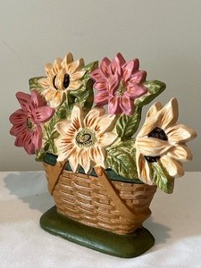 lot 178 image: Pair of Cast Iron Floral Longaberger Door Stoppers