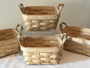 lot 176 image: Four Small Blonde Longaberger Baskets