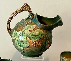 lot 1 image: Antique Roseville Pottery Bushberry Pitcher and Six Handled Cups