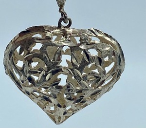 lot 387 image: Two Vintage Silver Pendants