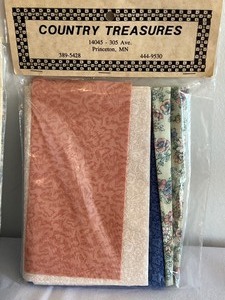lot 424 image: Country Treasures Small Packages of Fat Quarters Fabrics