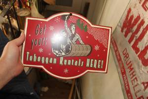 lot 510 image: Get Your Toboggan Rental Here Metal Wall Sign