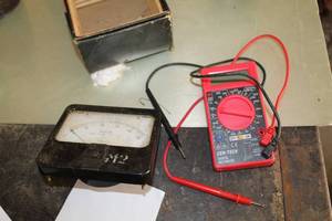 lot 670 image: Cen-Tech Digital Multimeter, Simpson Volt Meter