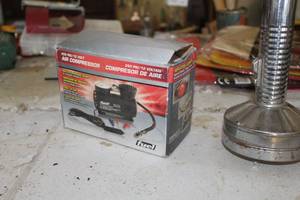 lot 712 image: Fuel 12V250PSI Air Compressor (in original packaging)