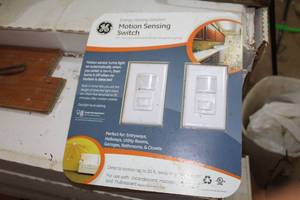 lot 719 image: GE Motion Sensing Switch (in original packaging)