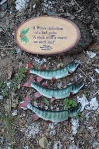 lot 789 image: Lot of (4) Home Dcor - (3) Fish, (1) A Wifes Definition of a fish pole�