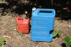 lot 803 image: Lot of (2) Cans - 2-Gallon Gas Can, Igloo 6-Gallon Water Can