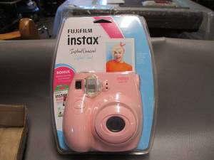 lot 29 image: FujiFilm Instax Instant Camera and Phone Case