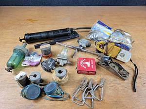 lot 2214 image: Lot of Misc. Shop Supplies - Motor Couplers, Clamp Meter, Grease Gun, Switches and More