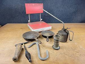 lot 2279 image: (2) Cast Iron Pans (6 & 8), Vintage Oiler, Brass Firehose Nozzle, Stadium Seat and More
