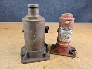 lot 2368 image: Pair of Bottle Jacks - Larger one works, other pumps but does no raise - NO SHIPPING