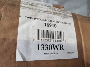 lot 39 image: Steel Wedge Lock Metal Bed Frame with Rug Rollers - Twin