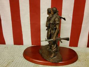 lot 6 image: Vietnam Era bronze soldiers  statue  with wood base.