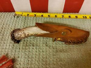 lot 7 image: Hand made deer antler fixed blade knife.