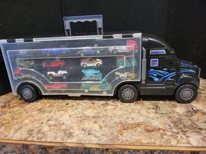lot 33 image: Hot Wheels Transport Truck (29) in all