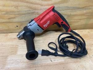 lot 33 image: MILWAUKEE 8 Amp Corded 12 in. Hammer Drill Driver