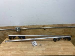 lot 42 image: CARGOLOC 2-Piece 60 in. Roof Top Cross Bar Set, for Use with Existing Raised Side Rails Only