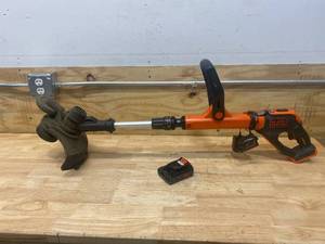 lot 43 image: BLACK  DECKER 20V String Trimmer with Battery (2.5 AH) and Charger
