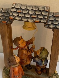 lot 46 image: 1990 Goebel Figurine Lets Tell the World