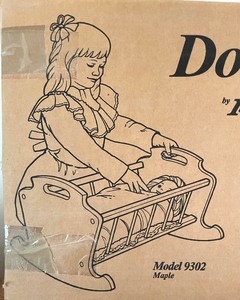 lot 241 image: New Radio Flyer Doll Cradle