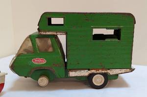 lot 233 image: Vintage Toy Boat and Tonka RV