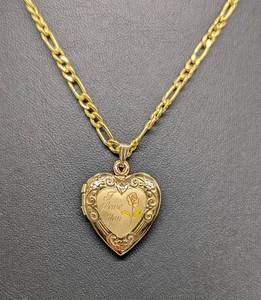 lot 40 image: 10k Gold Figaro Chain and 14k Heart Locket