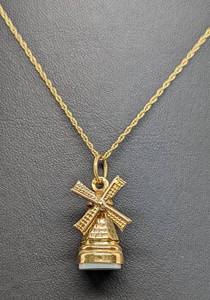 lot 41A image: 14k Gold Twist Chain and Windmill Pendant
