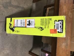 lot 8 image: RYOBI ONE 18V 13 in. Cordless Battery String TrimmerEdger, Includes Battery and Charger - Review all pictures