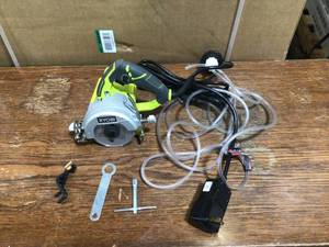lot 27 image: RYOBI 4 in. Tile Saw - Customer Return- Review all pictures