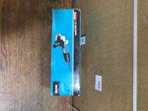 lot 28 image: 7.5 Amp Corded 4-12 in. Easy Wheel Change Compact Angle Grinder with Grinding Wheel, Wheel Guard and Side Handle - Used - Customer Return