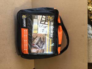lot 61 image: GLADIATOR Cargo Nets  7.3 ft. x 13.3 ft. Heavy-Duty Trailer Cargo Net, Integrated Mesh, Adjustable, Certified Attachment Straps, Bag Included, Customer Returns May Include missing Pcs Review all pictures