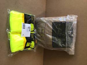 lot 76 image: Dewalt Work Pants, T Shirts Pack of 2, Customer Returns, Review all pictures