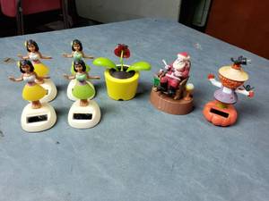 lot 107 image: Solar Dashboard Dancing Figures