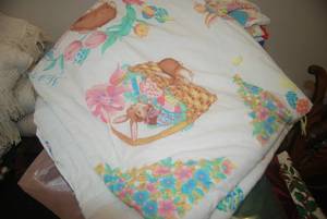 Handmade quilts and several table c...