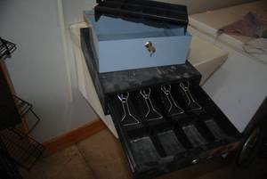 Cash box with key and cash register...