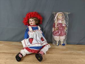 lot 108 image: Raggedy Ann Porcelain Doll and Standing Blonde Doll N