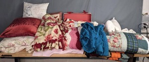 lot 130 image: Assortment of Blankets, Quilts, Crocheted Afghans, Decorative Pillows, Plush Toys, & Slippers  W