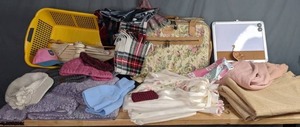 lot 134 image: Mixed Lot Protocol Suitcase, Bathroom Rugs, Shower Curtains, Makeup Bag, Dry Erase Boards, Hats, and More  W