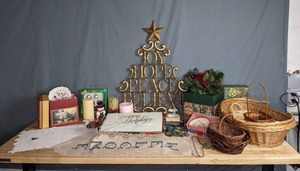 lot 140 image: Mixed Lot  Christmas Decor, Welcome Wall Hanging, Wicker Baskets, Storm Glass, Candles, Peppertree Porcelain Teaware, and More  W