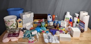 lot 122 image: Assortment of Bathroom Supplies Puffs Kleenex, Vaseline Lotion, Trash Cans, Hand Soap, Dove Body Wash, Sonicare Power Toothbrush, Con Air Hair Dryer, Colgate Toothpaste and More W