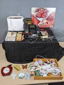 lot 138 image: Mixed Lot Oster Toaster,  Panasonic Bluetooth Telephone, Apple Painting, Apple Clock, Beeswax Candles and Much More  W