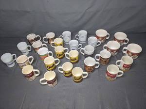 lot 174 image: An Assortment of XXx Coffee Cups Y