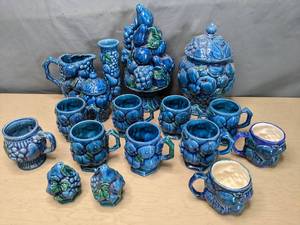 lot 159 image: Collection of Vintage 1960s Inarco Mood Indigo Blue Ceramic Fruit Topiary Centerpiece, Mugs, Vase, Pitcher, Cookie Jar, & More Y