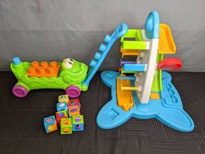 lot 276 image: Kids Toys Fisher-Price Tumble Down Toy & Fisher-Price Stack n Surprise Blocks Musical Croc Block Wagon Z
