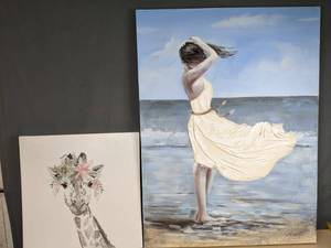 lot 249 image: Pair of Canvas Art Prints Walk on the Beach and Giraffe Wearing Flower Crown  Q