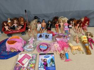 lot 231 image: Collection of Barbie Dolls Small Red Wagon Microphone Frozen Box and Stickers Powerpuff Girls Figurine   Z