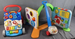 lot 257 image: Childrens Toys V-Tech Sit to Stand Activity Walker, Fisher Price Popper Push Toy, Activity Station  Z