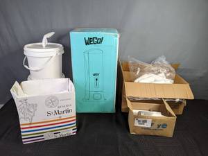 lot 324 image: An Assortment of Variety of Items Liquid Soap Dispenser, 8 oz. Bottles, Haircut Capes, and a Fork Dispenser P